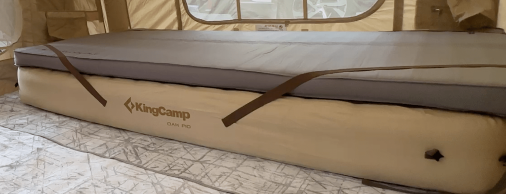 The KingCamp Self-Inflating Sleeping Pad Secured on Air Mattress